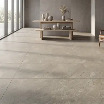 Sala luminosa con gran ventanal y vista al patio, amoblada y con un piso de cerámica estilo piedra Braken Grafito